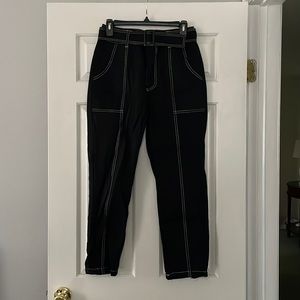 black cargo pants with white stitching